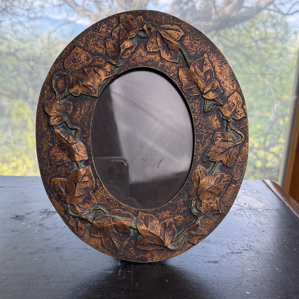 Vintage Oval Frame with Leaf Motif